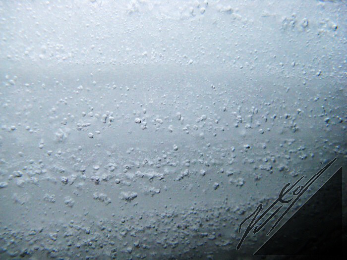 A porous lake ice with air bubbles.