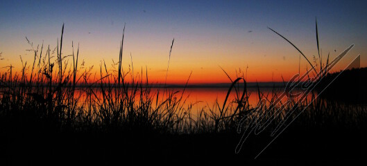 A sunset over Archipelago Sea during midsummer. Auringonlasku saaristomeren yllä juhannuksena.