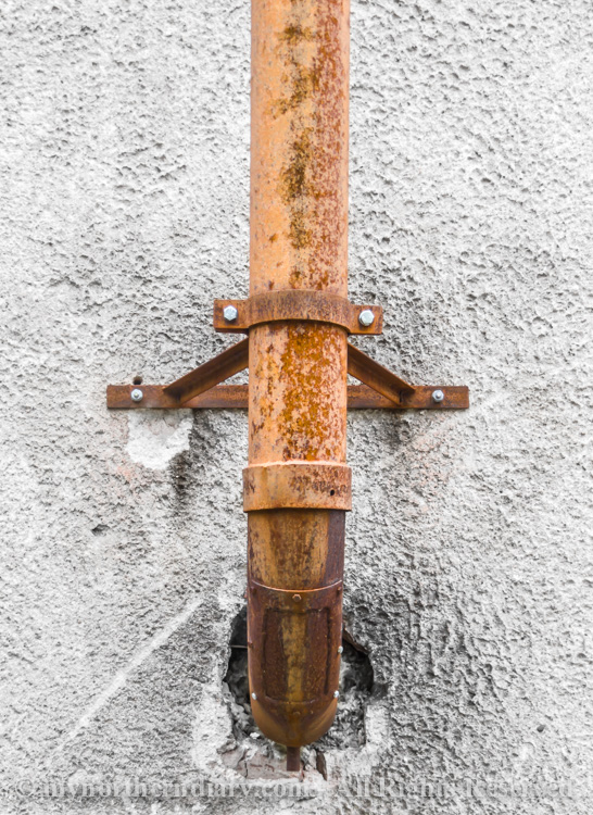 A-rusty-pipe-on-a-wall-CRW_2183.jpg