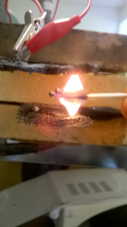 Burning-match-in-strong-electric-field-flames-against-gravity-WP_20160612_001.jpg