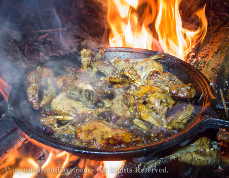 Frying-hazel-grouses-in-camp-fire-with-casted-iron-pan-CRW_4270.jpg